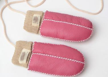 Κίνα Θερμότερα ραμμένα χέρι Sheepskin μωρών γάντια με την ανοικτό ροζ μανσέτα προμηθευτής